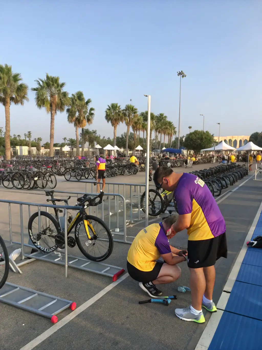 A photo of volunteers assisting at a cycling event, highlighting the community support and involvement in CRITERIUM CYCLISTE EN CHATAIGNERAIE.